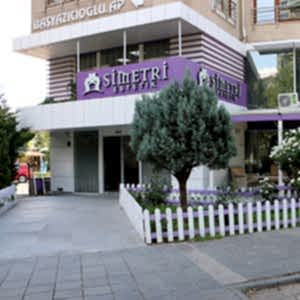 Simetri Estetik, Merkez